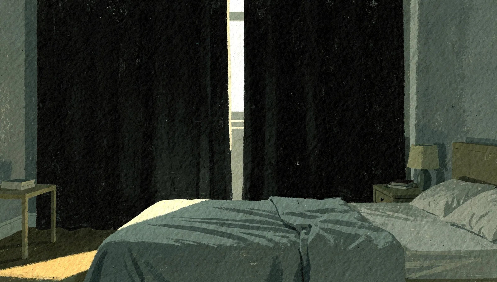 A bedroom in near darkness in the middle of the day, heavy blackout curtains fully drawn across the window and the whole room in deep shadow, with one narrow blade of hard white daylight escaping down the very edge of the curtain